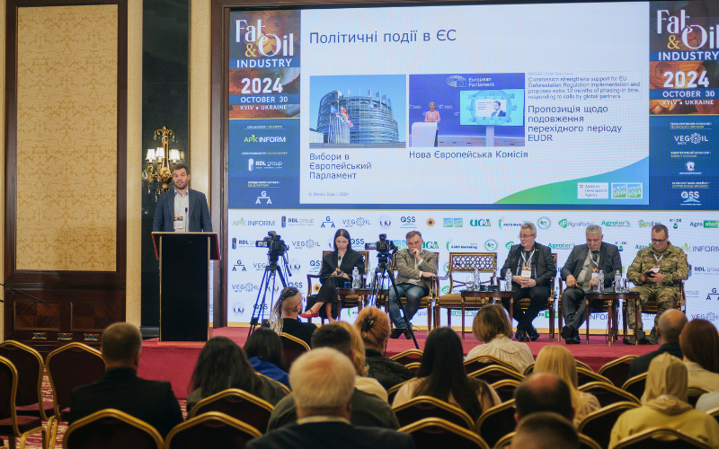 Volodymyr Pugachov presenting on soybean market trends at the Fat-and-Oil Industry-2024 Conference in Kyiv, highlighting EU regulations and sustainability.