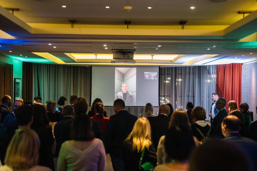 Participants watching a virtual address at the Donau Soja Members and Partners Meeting in Ukraine, December 2024.